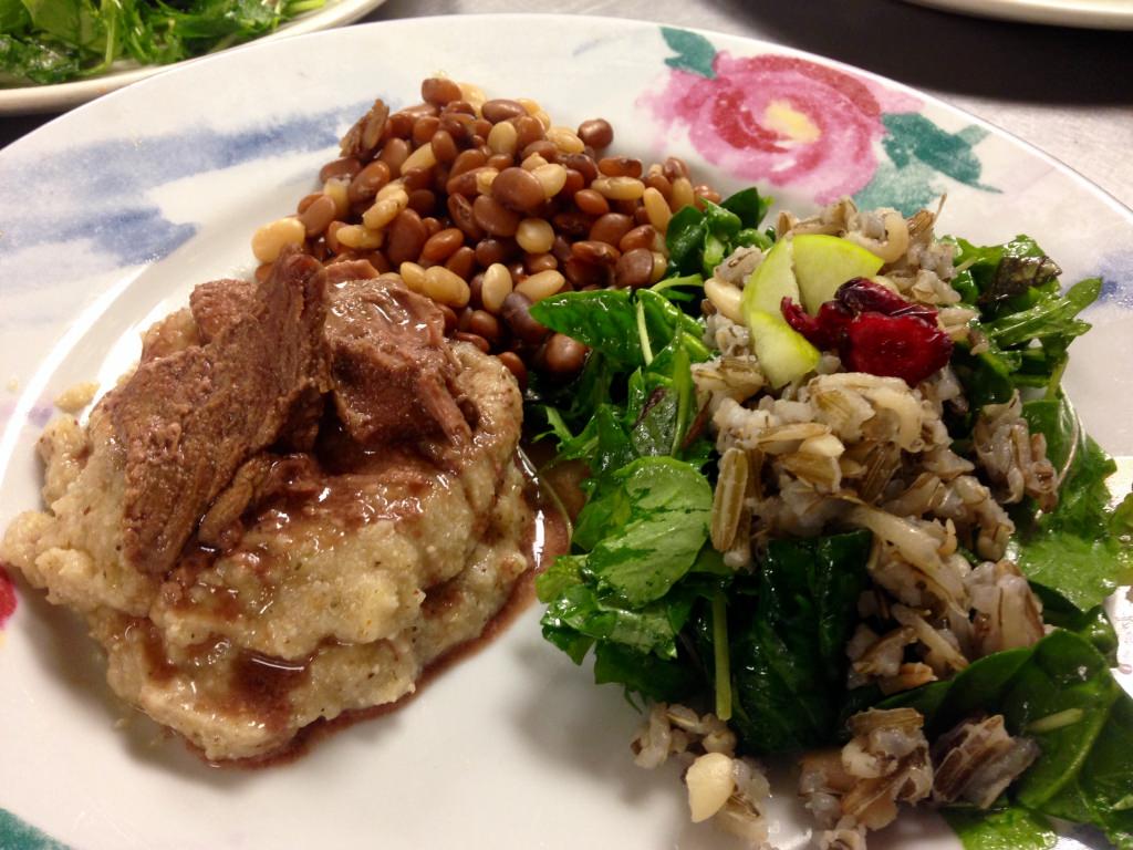 Braised buffalo over polenta, tepiary tri color beans, and wild rice salad is an example of the type of food attendees can expect at the Food Sovereignty Symposium and Festival.