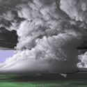 A colorized image of the tornado-producing supercell nearly 20 miles long and 12 miles high. The imagery from the simulation was built upon real world data collected near the May 24, 2011 supercell, which spawned several tornadoes including the EF-5 that touched down near El Reno and Oklahoma City, Oklahoma.