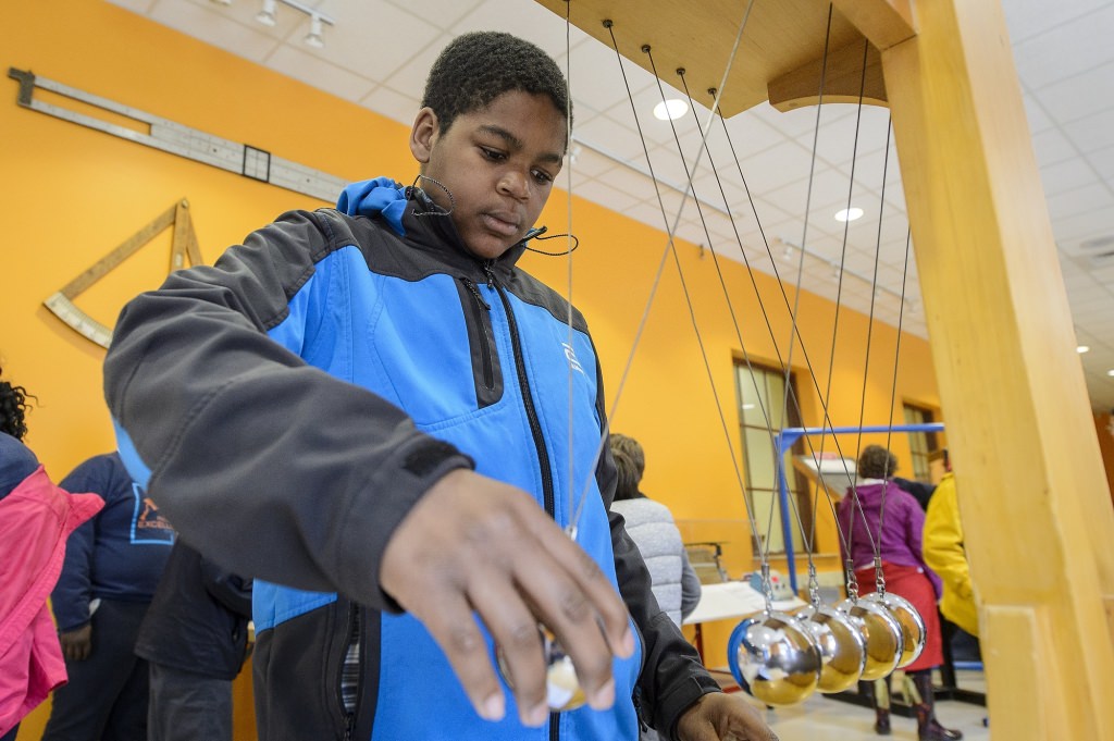 Students from the Milwaukee Excellence Charter School, including John Hayes, take a tour of the L.R. Ingersoll Physics Museum in Chamberlin Hall during a Bucky's Classroom event at the University of Wisconsin-Madison on April 27, 2017. Bucky's Classroom is a UW outreach program design to partner with K-8 Wisconsin schools to promote the value of higher education and provide classroom resources and an opportunity to directly engage with university students. (Photo by Bryce Richter / UW-Madison)