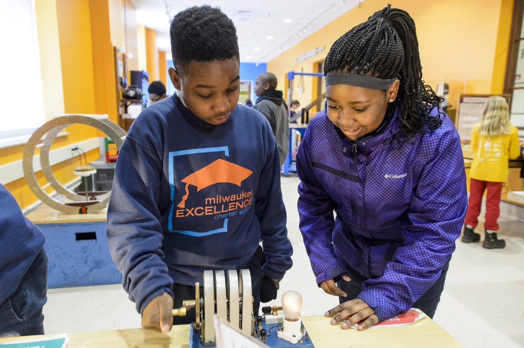 Students from the Milwaukee Excellence Charter School, including Eric Shurn (left) and Tanijah Dillard (right), take a tour of the L.R. Ingersoll Physics Museum in Chamberlin Hall during a Bucky's Classroom event at the University of Wisconsin-Madison on April 27, 2017. Bucky's Classroom is a UW outreach program design to partner with K-8 Wisconsin schools to promote the value of higher education and provide classroom resources and an opportunity to directly engage with university students. (Photo by Bryce Richter / UW-Madison)