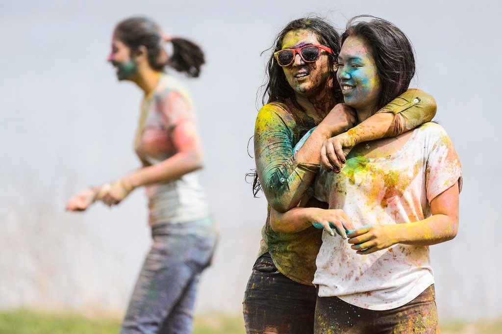 Hundreds of students participate in the spirited Hindu tradition of throwing colored powder during Rang de Madison, a Holi festival of color hosted by the Madison Hindu Students Association outside of Dejope Residence Hall at the University of Wisconsin-Madison on April 15, 2017. The event, which celebrates the arrival of spring and victory of good over evil, was held in collaboration with UW-Madison's India Students Association and Indian Graduate Students Association. (Photo by Jeff Miller/UW-Madison)