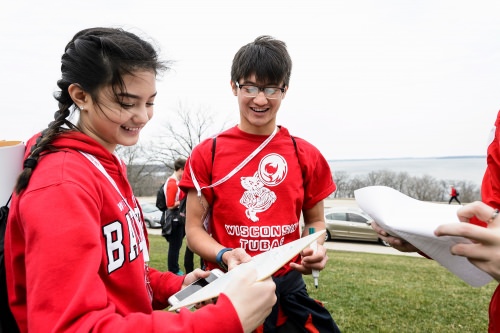 Undergraduate CJ Zabat and his sister Abby, 15, of Bartlett, Ill., stop at Observatory Hill during the Sibs Day scavenger hunt.