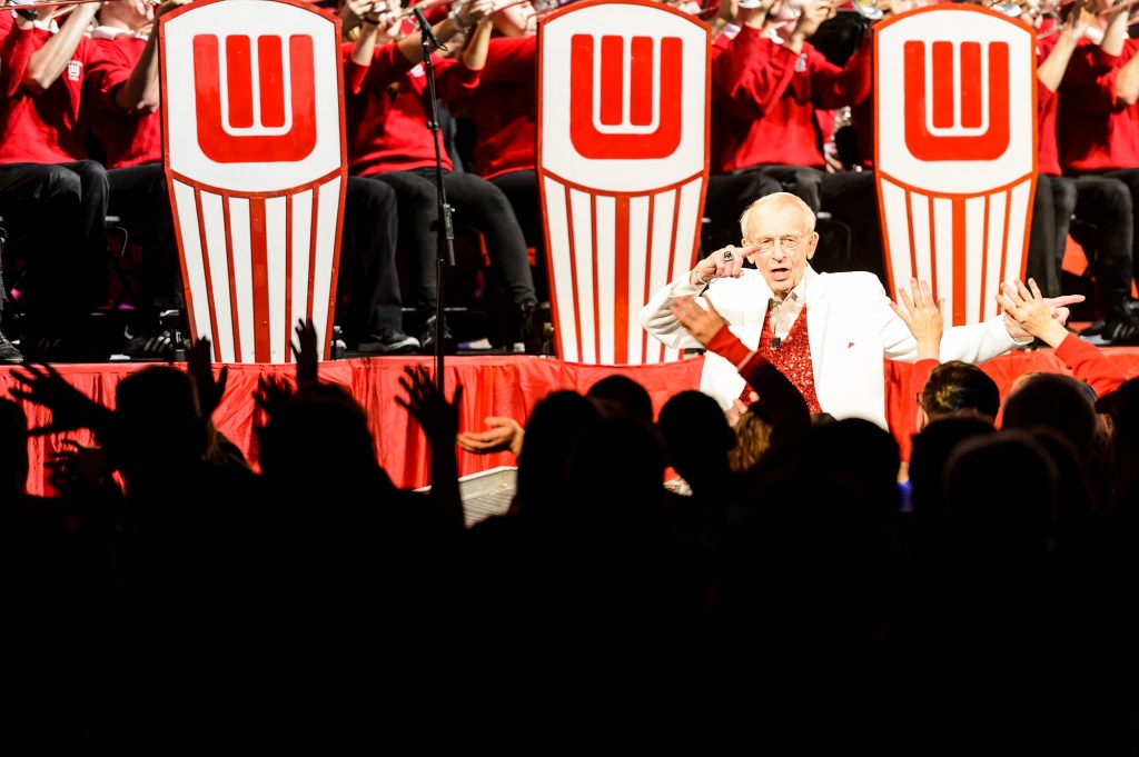 Band director Mike Leckrone, 80 and now in his 47th year at UW-Madison, gets the crowd going during the 43rd annual UW Varsity Band Spring Concert at the Kohl Center at the University of Wisconsin-Madison on April 20, 2017. This year's concert, entitled "Nobody Does It Better: 20 Years at the Kohl," comes after Leckrone's return to campus following recovery from a medical procedure this past winter. (Photo by Jeff Miller/UW-Madison)