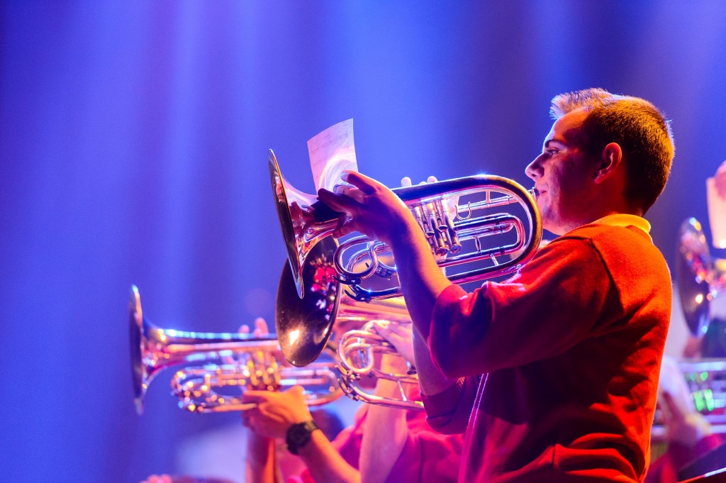 Members of the mellophone section play during the 43rd annual UW Varsity Band Spring Concert at the Kohl Center at the University of Wisconsin-Madison on April 20, 2017. This year's concert, entitled "Nobody Does It Better: 20 Years at the Kohl," comes after band director Mike Leckrone's return to campus following recovery from a medical procedure this past winter. Leckrone is 80 and now in his 47th year at UW-Madison. (Photo by Jeff Miller/UW-Madison)