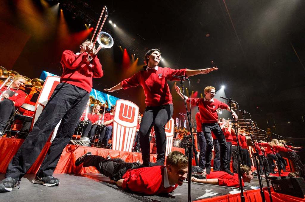 Trombone players perform "Surfin' USA" as part of a Beach Boys medley during the 43rd annual UW Varsity Band Spring Concert at the Kohl Center at the University of Wisconsin-Madison on April 20, 2017. This year's concert, entitled "Nobody Does It Better: 20 Years at the Kohl," comes after band director Mike Leckrone's return to campus following recovery from a medical procedure this past winter. Leckrone is 80 and now in his 47th year at UW-Madison. (Photo by Jeff Miller/UW-Madison)
