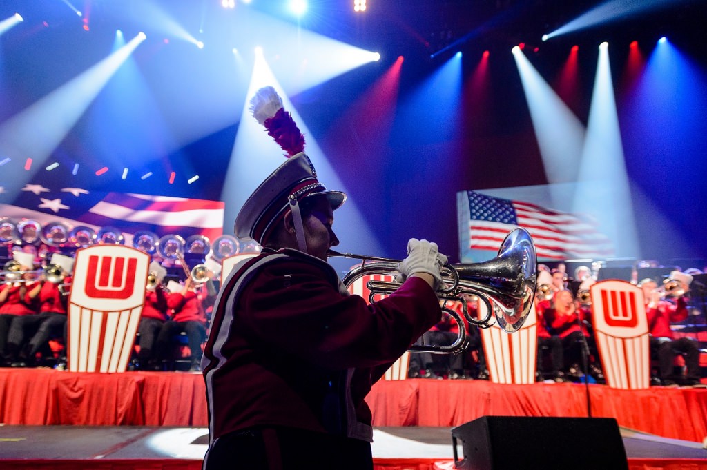 Band members perform a patriotic march during the 43rd annual UW Varsity Band Spring Concert at the Kohl Center at the University of Wisconsin-Madison on April 20, 2017. This year's concert, entitled "Nobody Does It Better: 20 Years at the Kohl," comes after band director Mike Leckrone's return to campus following recovery from a medical procedure this past winter. Leckrone is 80 and now in his 47th year at UW-Madison. (Photo by Jeff Miller/UW-Madison)