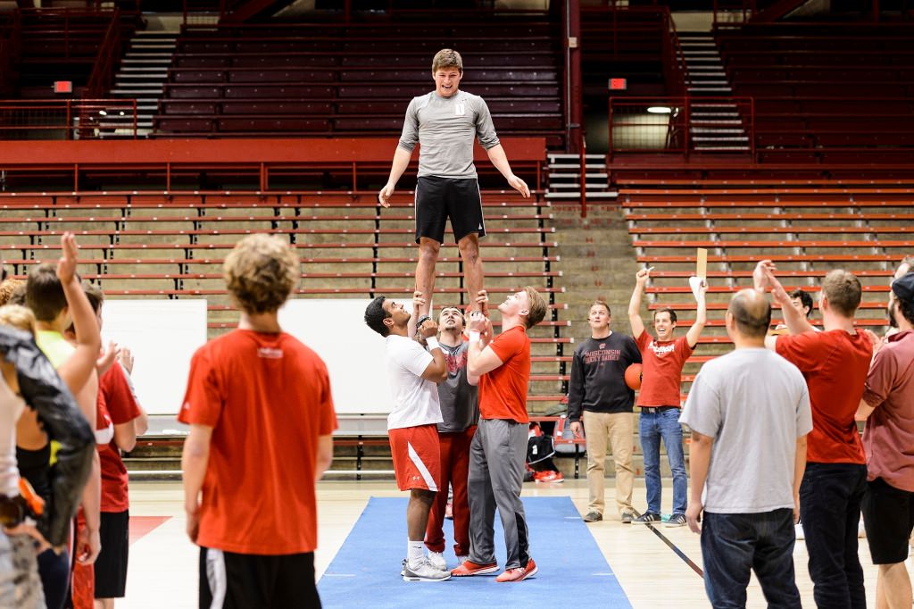 Sophomore Spencer Bernhardt practices a pyramid stand with the UW Spirit Squad during preliminary tryouts for one of seven positions on the 2017-2018 Bucky Badger mascot team. The event was held at the Field House at the University of Wisconsin-Madison on April 17, 2017. Bernhardt ultimately did not make the team. (Photo by Jeff Miller/UW-Madison)