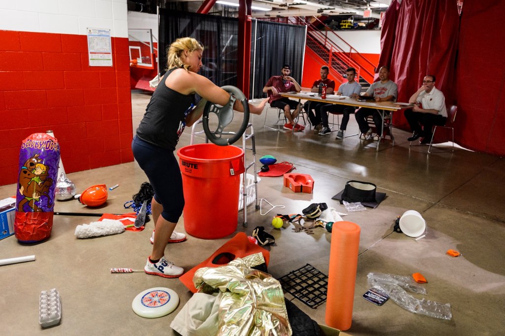 First-year student Katherine Previte improvises with a variety of props before a panel of judges during preliminary tryouts for one of seven positions on the 2017-2018 Bucky Badger mascot team. The event was held at the Field House at the University of Wisconsin-Madison on April 17, 2017. Previte, one of the only women to try out this year, did not advance to make the team. (Photo by Jeff Miller/UW-Madison)