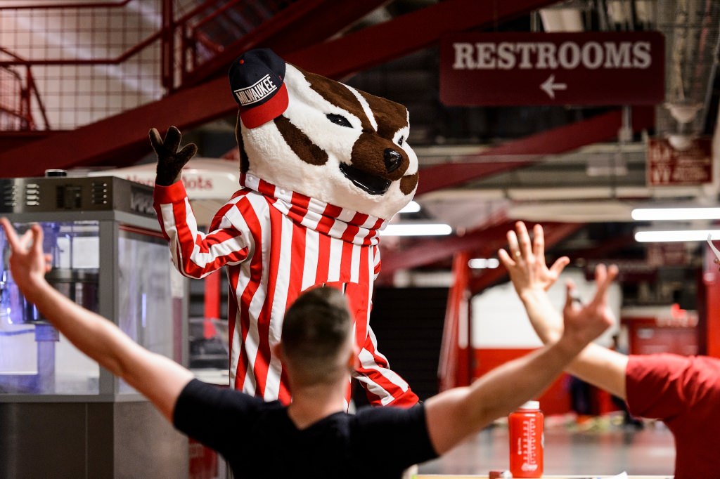 Improvising a one-minute skit before a panel of judges, a Bucky candidate incorporates a judge's Milwaukee ball cap during preliminary tryouts for one of seven positions on the 2017-2018 Bucky Badger mascot team. The event was held at the Field House at the University of Wisconsin-Madison on April 17, 2017. (Photo by Jeff Miller/UW-Madison)