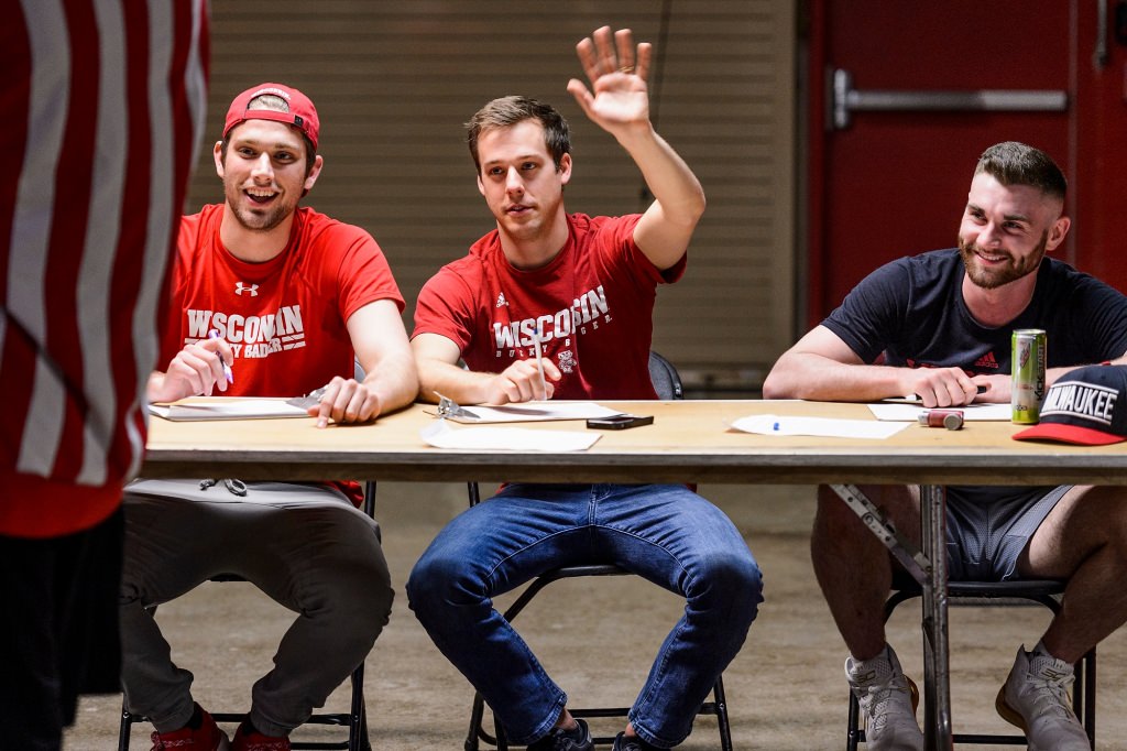 Former Buckys turned judges, from left to right, Pat Smet, Kieth Christensen and Kaleb Hunnicutt watch as a candidate improvises a one-minute skit during preliminary tryouts for one of seven positions on the 2017-2018 Bucky Badger mascot team. The event was held at the Field House at the University of Wisconsin-Madison on April 17, 2017. (Photo by Jeff Miller/UW-Madison)