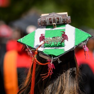 A graduate's mortarboard, decorated to the theme of flamingoes on Bascom Hill, is pictured following UW-Madison's spring commencement ceremony at Camp Randall Stadium at the University of Wisconsin-Madison on May 13, 2017. The outdoor graduation is expected to be attended by more than 6,000 bachelor's and master's degree candidates, and their guests. (Photo by Jeff Miller/UW-Madison)