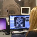 Sara John, an MRI research technologist at the UW School of Medicine and Public Health, at work with an MR scanner in the Wisconsin Institute of Medical Research on campus.
