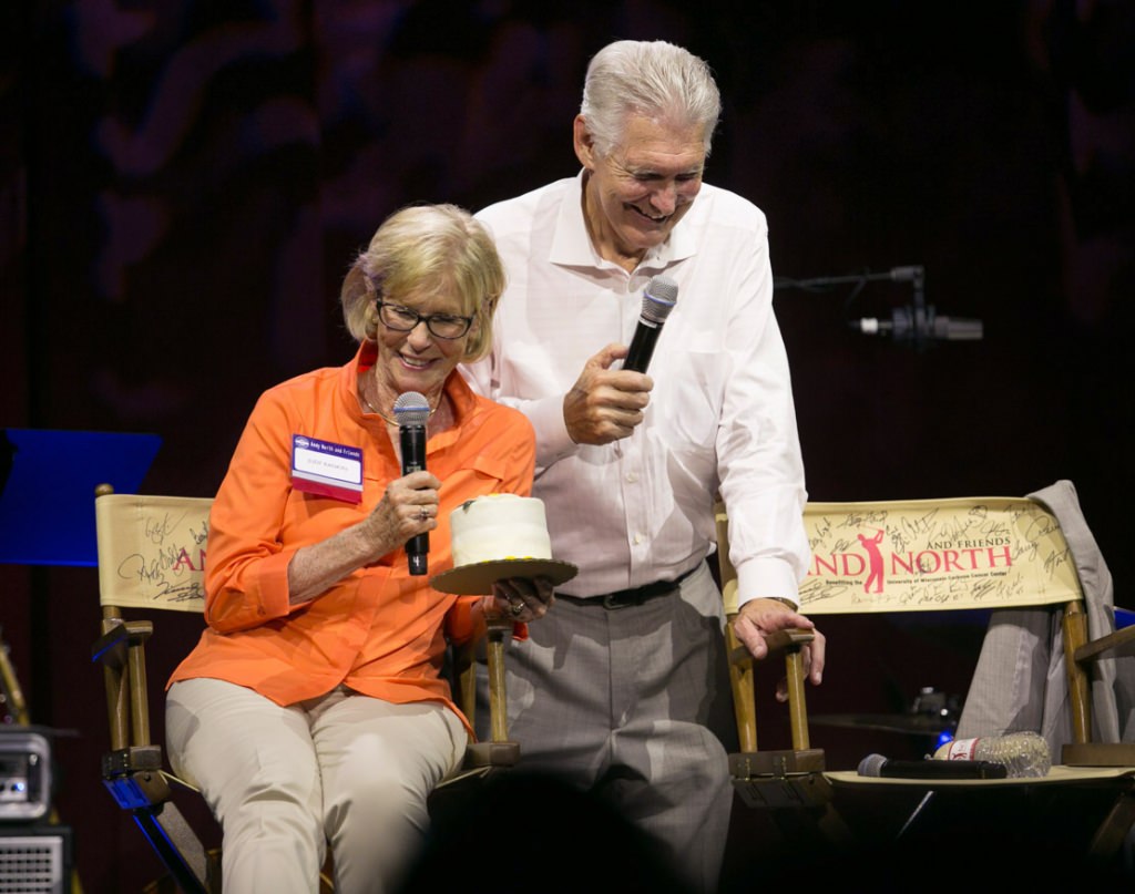 Smiles were everywhere as pro golfer Judy Rankin and Andy North enjoy the moment.