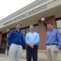 From left, Andrew Lewandowski, a pediatrician who heads the city’s renewable energy committee, city clerk-treasurer Mo Hansen, and Scott Williams, research and education coordinator at the Wisconsin Energy Institute, in front of Waterloo City Hall.
