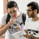 Alfred Sunaryo (left) and Hussein Alkhayat (right) plan their strategy for a campus scavenger hunt during an International Student Summer Institute class session in the School of Education Building. The scavenger hunt was designed to be both fun and practical — students covered a lot of ground and learned about many buildings and resources on campus. 