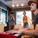 Rico Sisney (left), Maggie Vagle (middle) and Charlie Coffeen (right), members of the Chicago-based band Sidewalk Chalk, play for Live@WSUM on Aug. 4, 2017. 