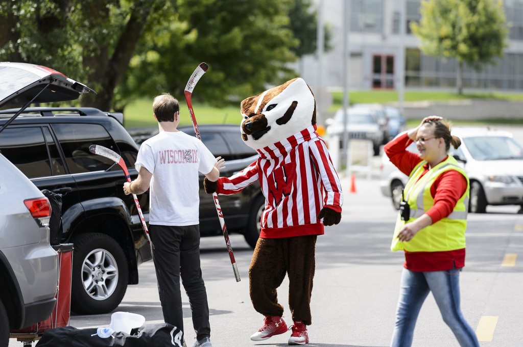 UW-Madison mascot Bucky Badger and countless Badger Buddy volunteers welcome and help new students moving in to the southeast residence halls at the University of Wisconsin-Madison on Aug. 26, 2017. Move in continues on Aug, 29, 30 and 31, and leads into weeks of Wisconsin Welcome programming and the start of the fall semester. (Photo by Jeff Miller / UW-Madison)