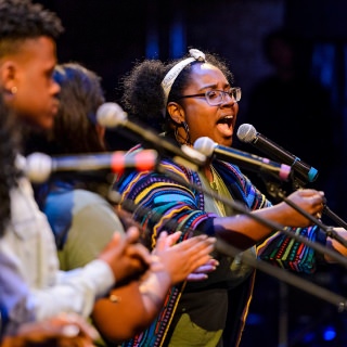 Student members of the University Gospel Choir sing during the Multicultural Orientation and Reception (MCOR) at the Wisconsin Union Theater's Shannon Hall at the University of Wisconsin-Madison on September 6, 2017. MCOR is part of a series of beginning-of-the-semester Wisconsin Welcome events. (Photo by Jeff Miller / UW-Madison)