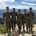 Wisconsin midshipmen take a break from their mountain warfare training to pose for a picture on top of the California Sierras.  From left to right: Colin Knight from New Berlin; Derek Campbell from Green Bay; Scott Brooks from Gross Pointe Farms, Michigan; and John Tilstra from Brandon.