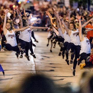 Members of the UW Dance Elite dance club impress the crowd as they perform while marching down State Street during the annual Homecoming Parade at the University of Wisconsin-Madison on Oct. 20, 2017. (Photo by Bryce Richter / UW-Madison)