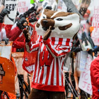 Photo of Bucky Badger warming up the crowd.