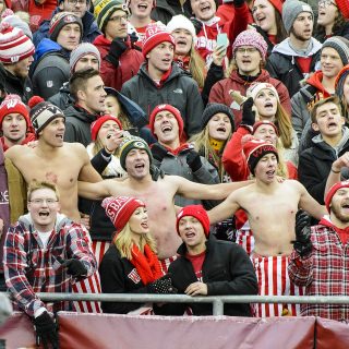 Photo of weather-tested Wisconsin Badger fans cheering on the team.