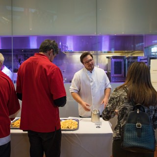 Executive Chef of Steenbock’s on Orchard, Sean Fogarty explains the aging process of cheese during the Life of Cheese event at Discovery Building's Steenbock's on Orchard Restaurant in Madison, WI. Saturday, Nov. 4, 2017. This event was about an exploration and tasting of cheese as it ages, from cheese curds to Parmesan-Reggiano. This event is put on by the Wisconsin Science Festival and Steenbock’s on Orchard exclusively for Family Weekend, and it was sold-out. (Photo by Hyunsoo Léo Kim | University Communications)