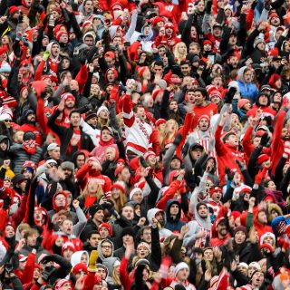 Wisconsin Badger fans dance to the song, "Jump Around," at the end of the third quarter as Wisconsin plays a football game against the Michigan Wolverines at Camp Randall Stadium at the University of Wisconsin-Madison on Nov. 18, 2017. Wisconsin won the game, 24-10. (Photo by Jeff Miller / UW-Madison)