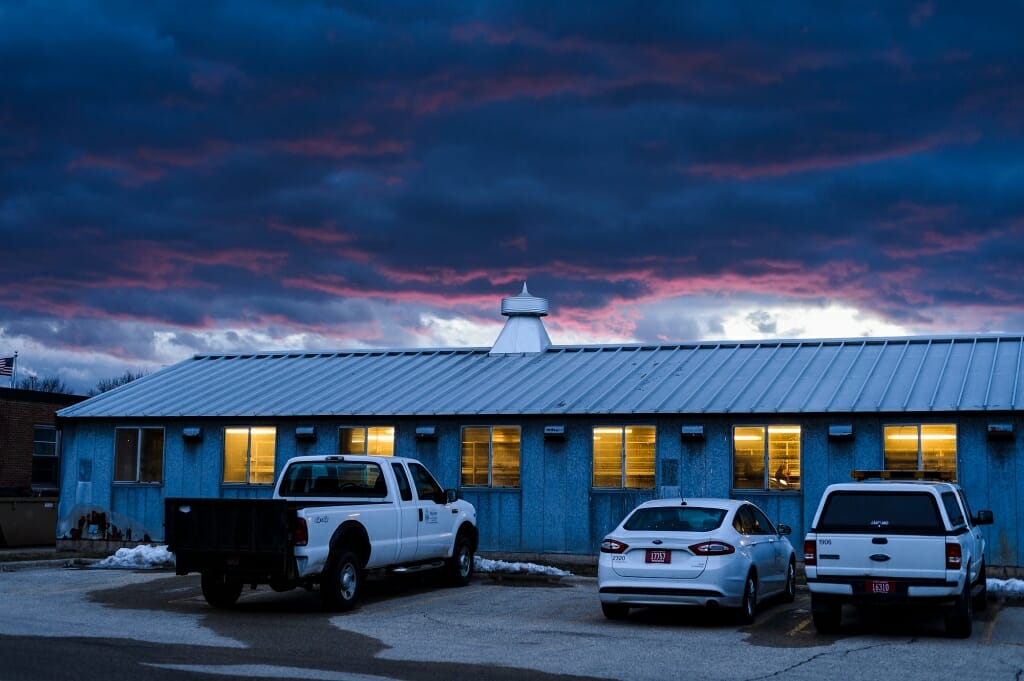 Photo: Clouds and sunset behind Poultry Research Lab