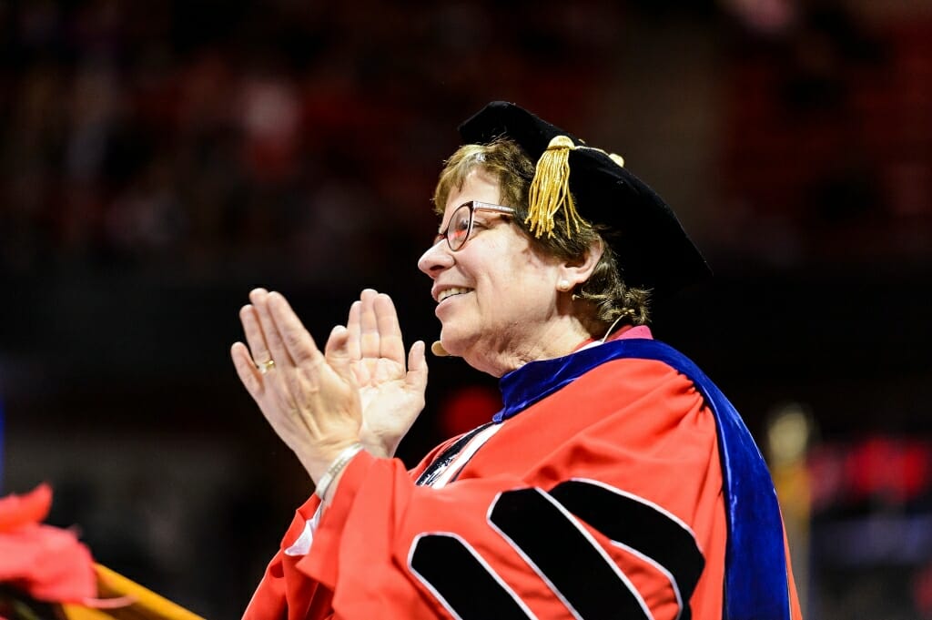 Chancellor Rebecca Blank applauds.