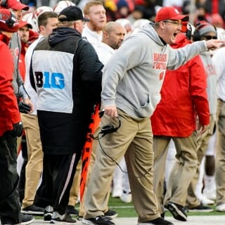 Wisconsin Badger's head coach Paul Chryst lets the referees know his feelings about a play call during a football game against the Michigan Wolverines at Camp Randall Stadium at the University of Wisconsin-Madison on Nov. 18, 2017. Wisconsin won the game 24-10. (Photo by Bryce Richter / UW-Madison)