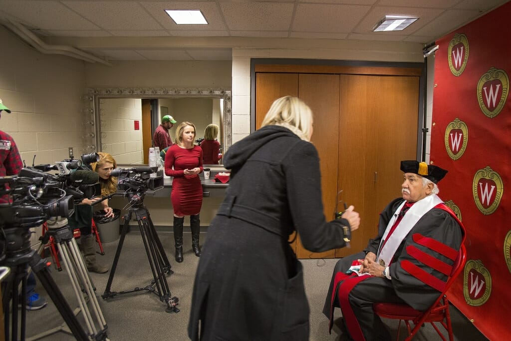 Photo of Reporters interviewing Barraza before the ceremony.