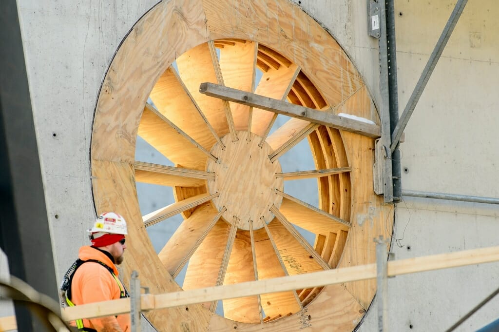 Photo: Closeup of acoustical coffer that looks like a wagon wheel