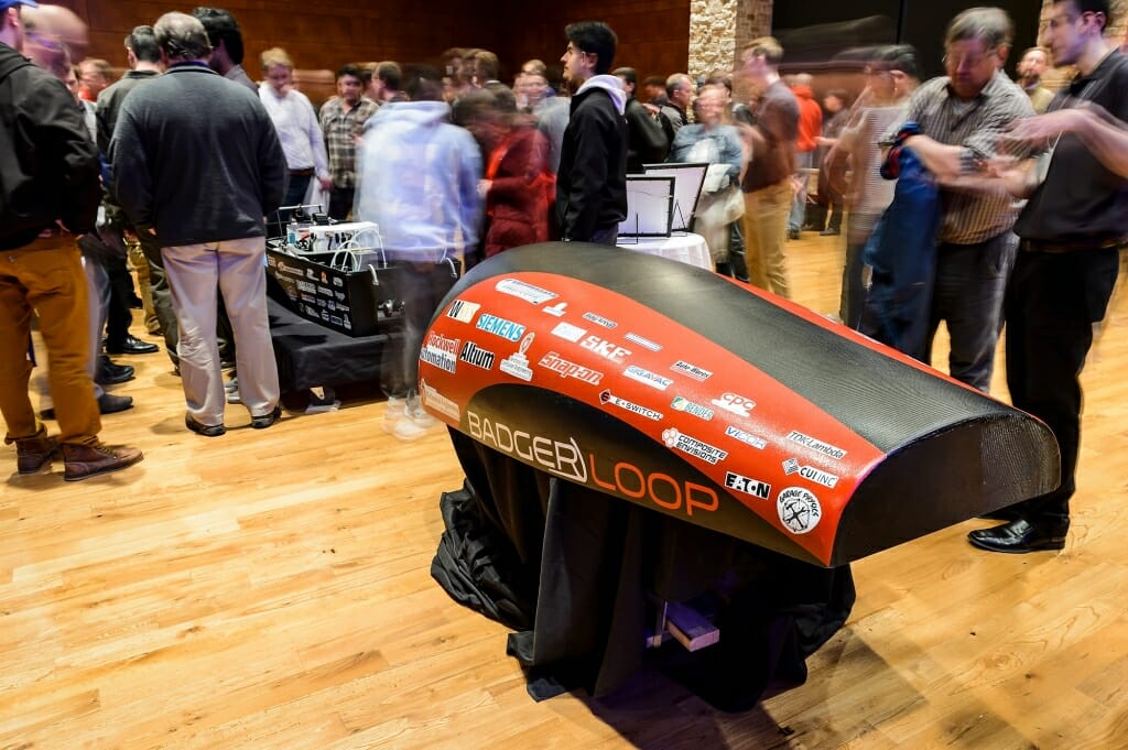 The carbon-fiber cover of Badgerloop Pod III, shown at the public unveiling. This year's competition requires use of an entirely self-propelled pod. 