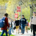 Students walk down the sidewalk of Bascom Hill during spring at the University of Wisconsin-Madison on May 4, 2017. (Photo by Bryce Richter / UW-Madison)