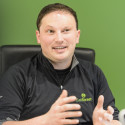 Matt Howard, chief executive officer at EatStreet, is pictured in the company's downtown Madison office on Feb. 26, 2018. EatStreet is an online food ordering and delivery service developed by three UW-Madison alumni, including Howard. (Photo by Bryce Richter / UW-Madison)