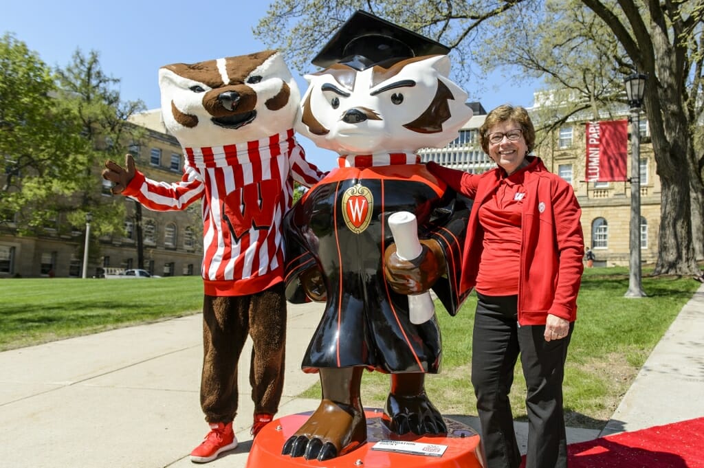 Photo of Bucky and Chancellor Blank posing with "Graduation Bucky," one of 85 life-sized statues across Dane County.