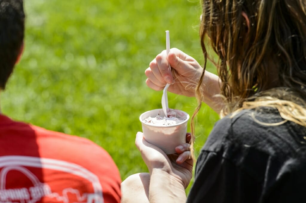 Photo of student eating ice cream.