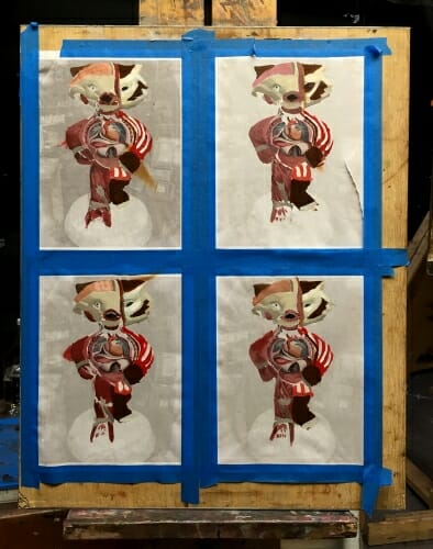 A photo of reference paintings done by Philip Salamone before he embarked on painting his 6-foot-tall Bucky statue. 