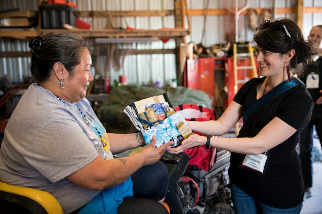 Photo: Catherine Reiland presenting gifts