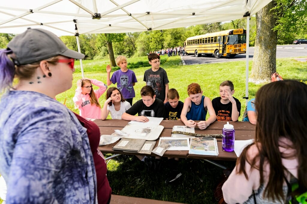 Photo: Students sitting around table