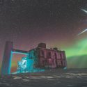 Photo of Ice Cube observatory with aurora borealis