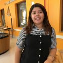 Senior Alejandra Torres Diaz, pictured at the Physics Museum on campus, received peer tutoring assistance last year and is now a tutor herself. “I love being in this position of helping others realize that they’re capable, that they can do this, and that they can have fun while doing it.”