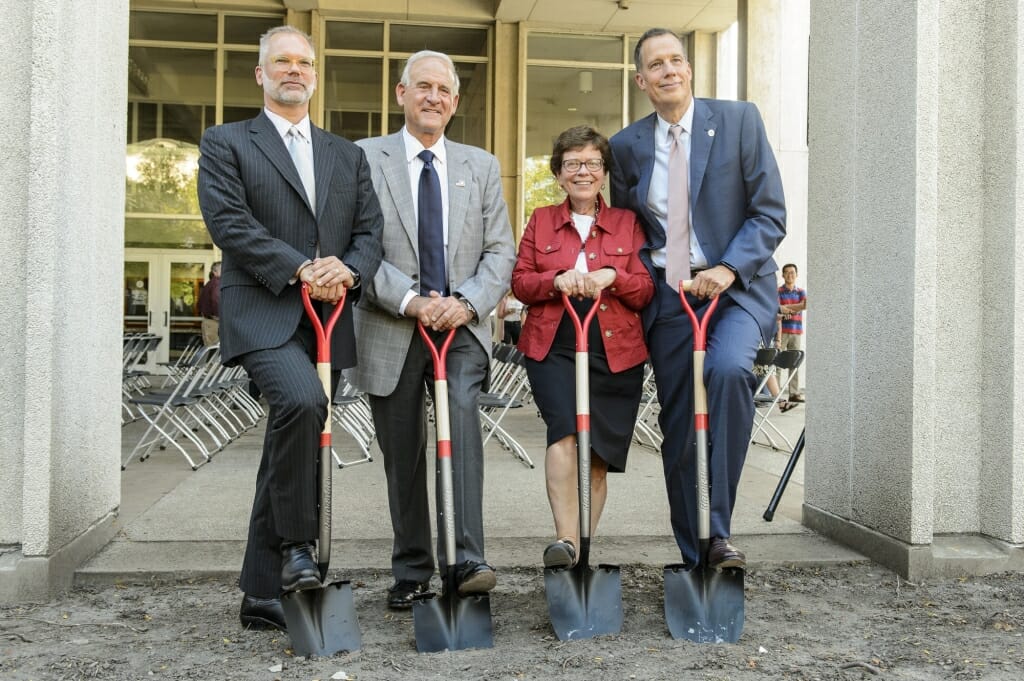 Officials line up before the groundbreaking.