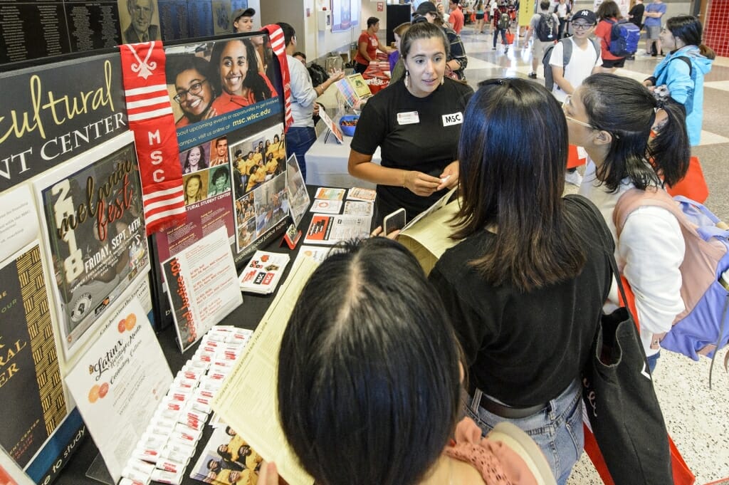 Students check out the Multicultural Student Center booth.