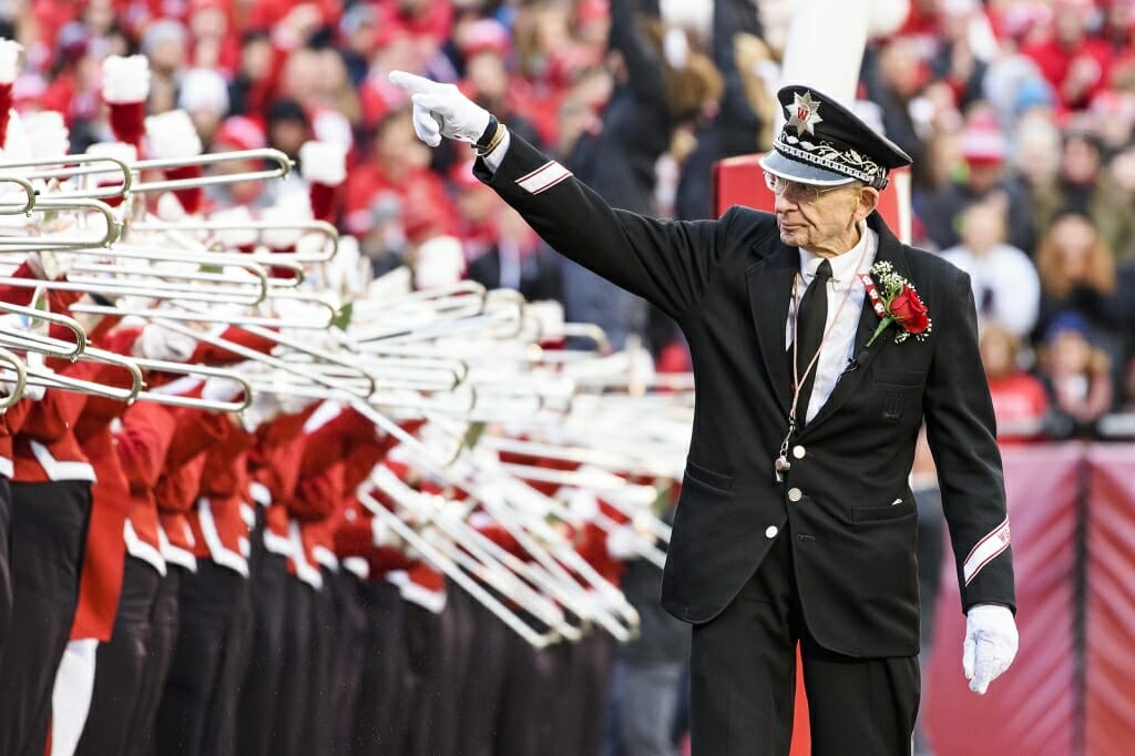Leckrone conducts the band during the football game.