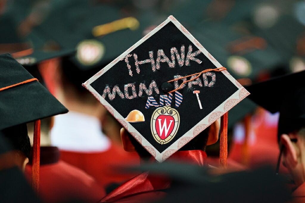Photo of mortarboard reading, "Thank Mom and Dad"