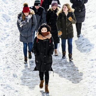 Photo: Students on snowy sidewalk