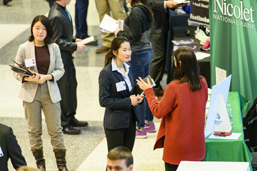 UW students talk with recruiters at the Career and Internship Fair in February 2019.