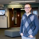 Photo: Nick Hillman standing outside the new SSTAR Lab offices.